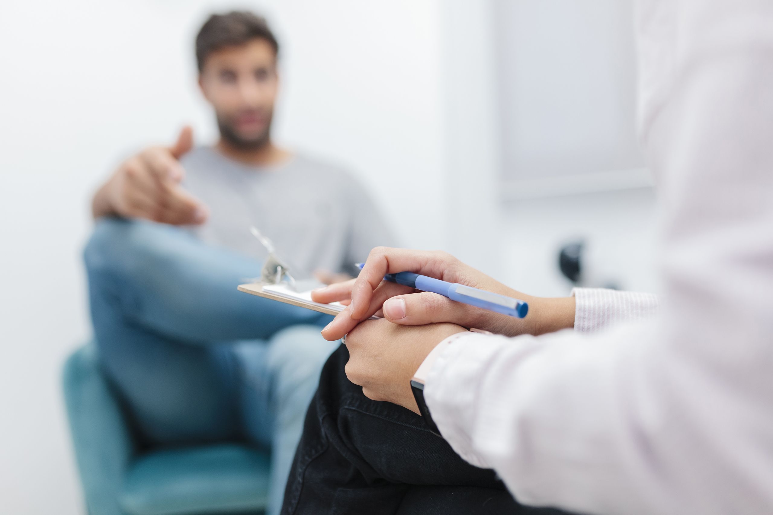 An image of a man speaking with his doctor.