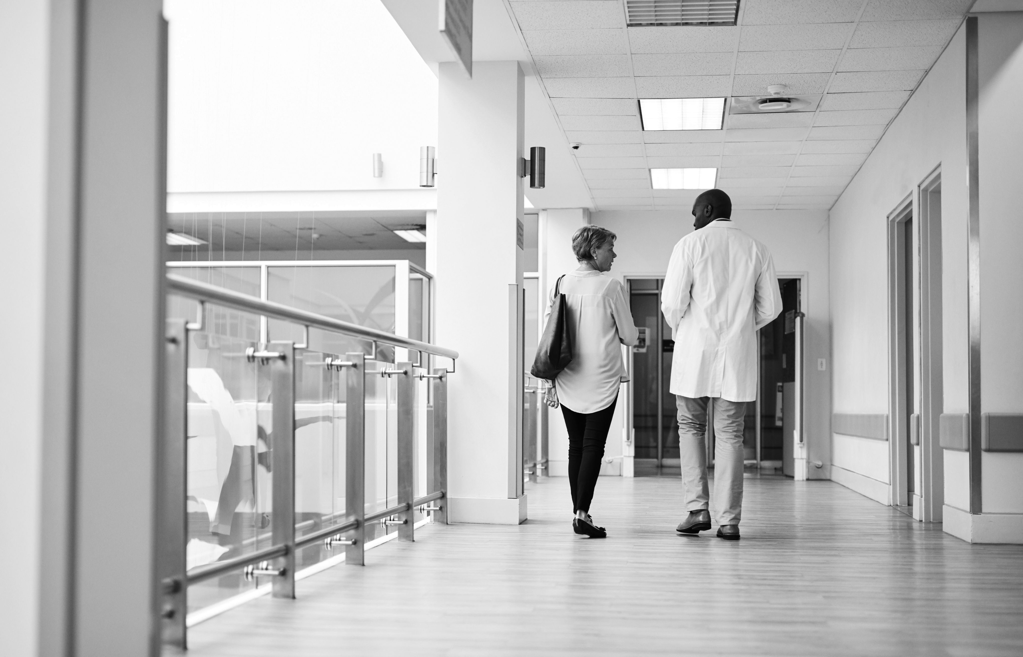 An image of a man speaking with his doctor.