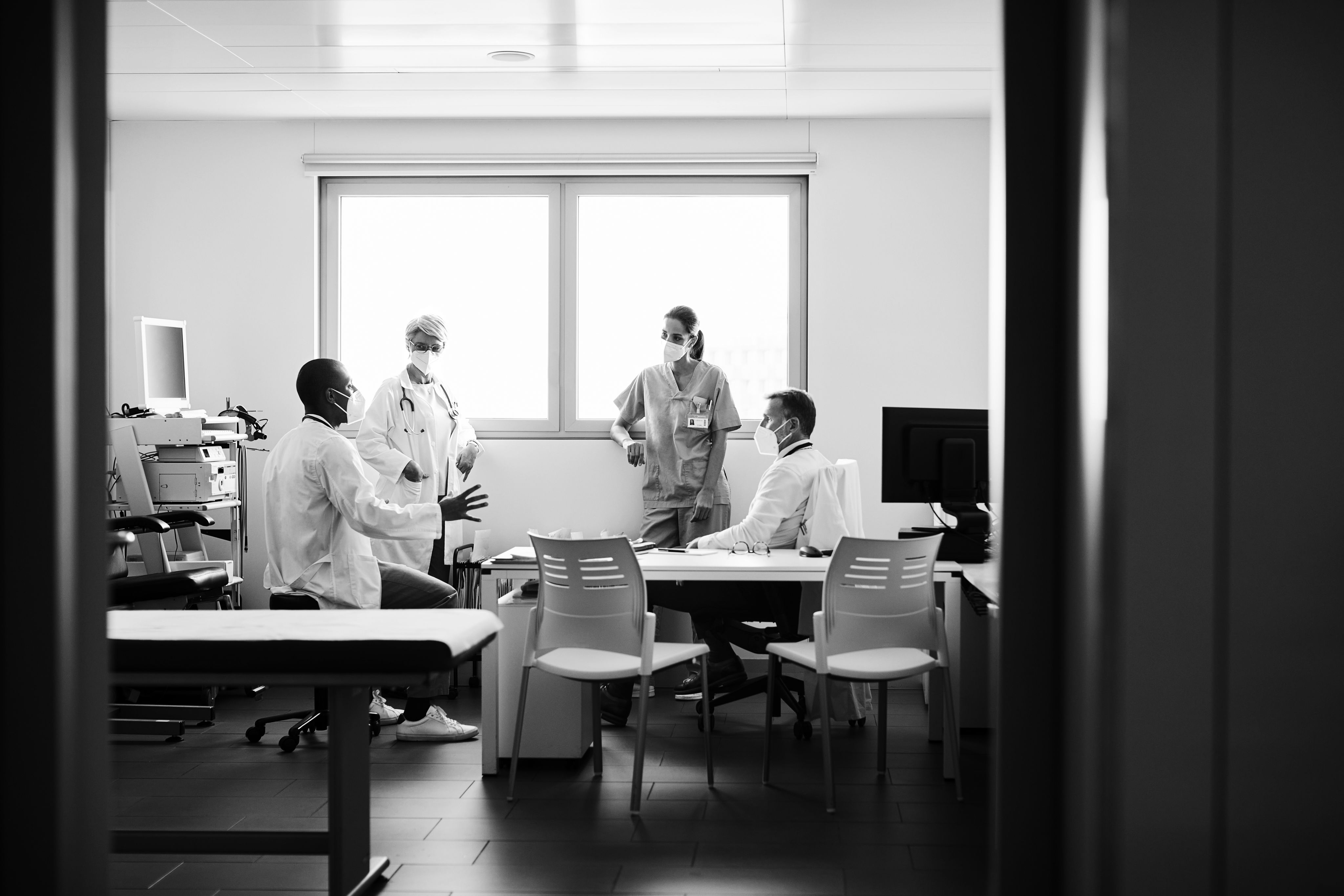An image of a man speaking with his doctor.