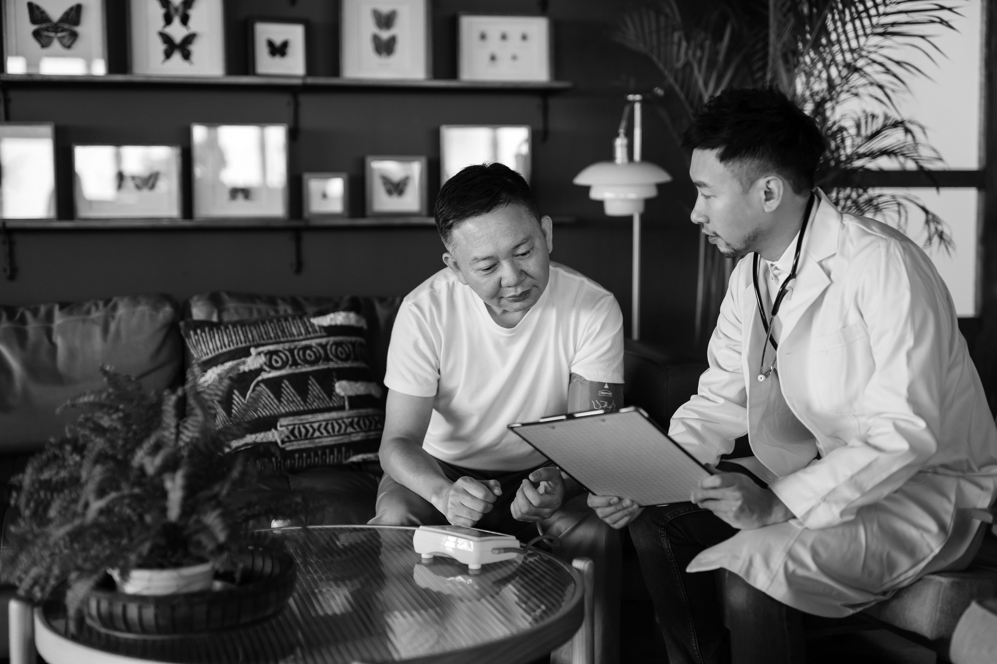 Image of a doctor and patient looking over patient results.