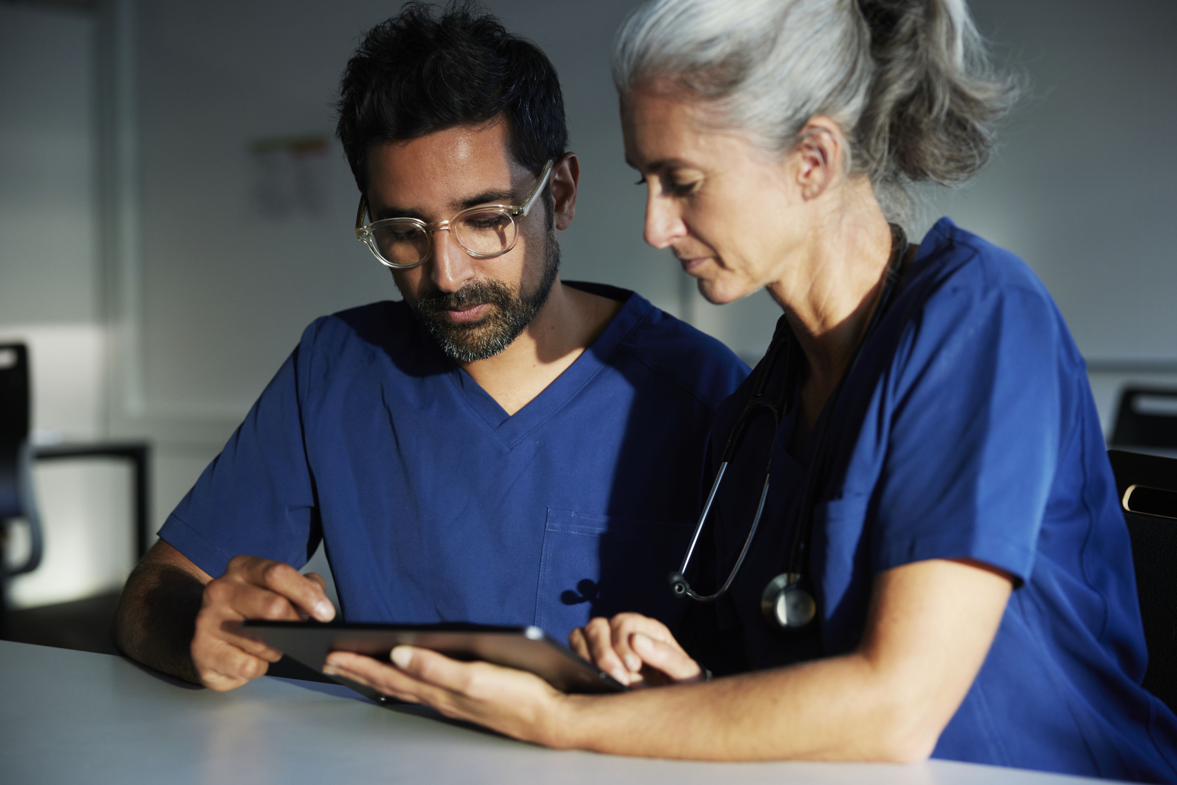 Image of two doctors reviewing results.